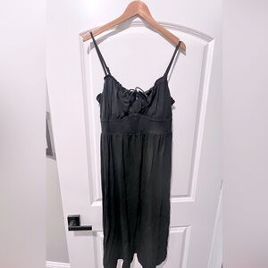 Smocked jersey knit peasant dress with pockets